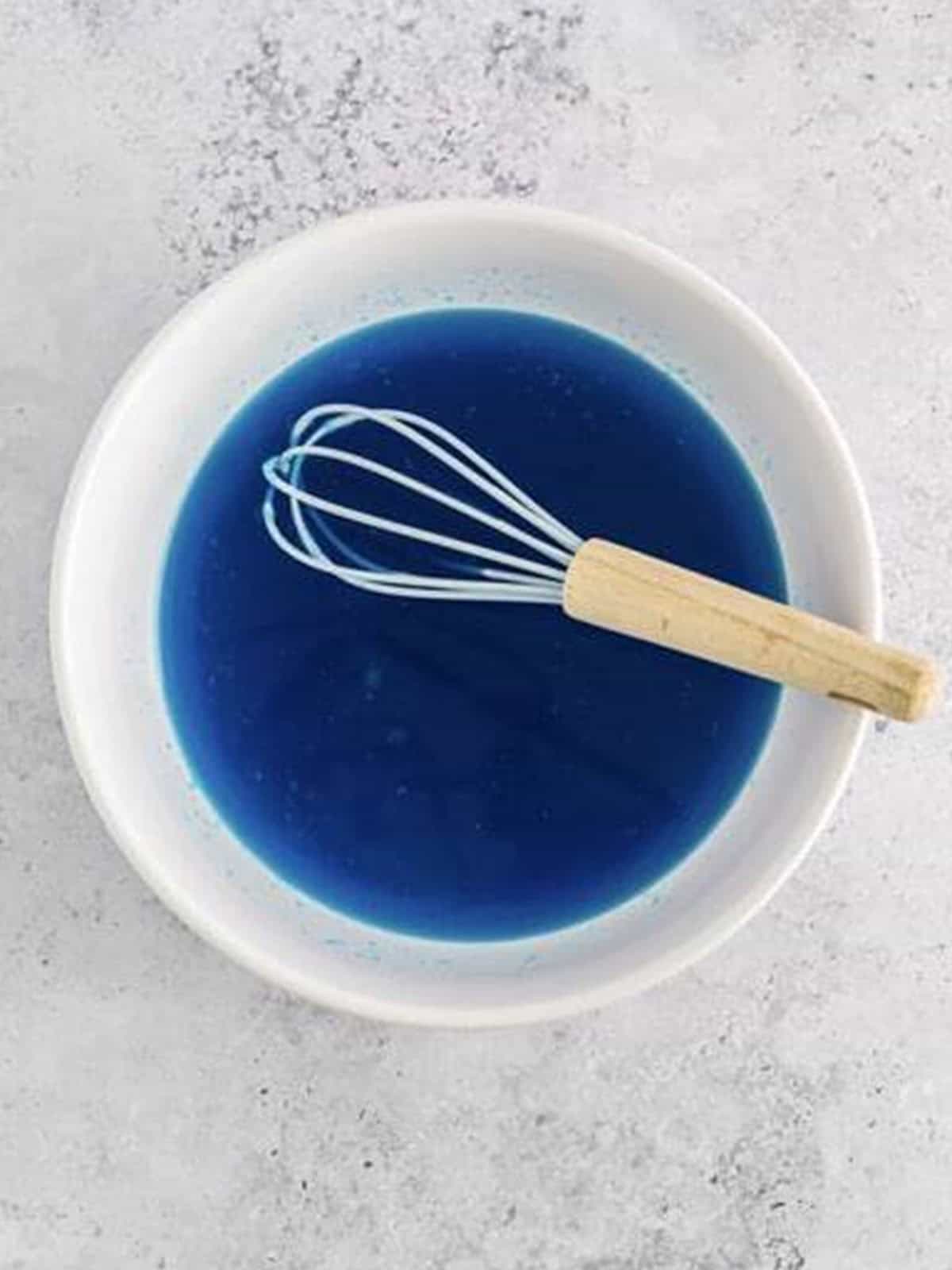Berry blue jello whisked into boiling water until fully dissolved.