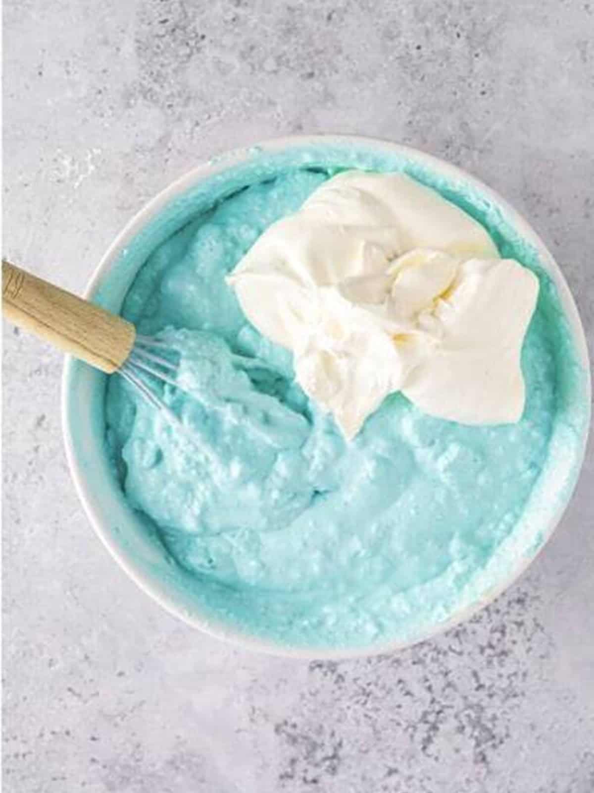The chilled blue jello mousse broken up smooth with more whipped topping folded in.