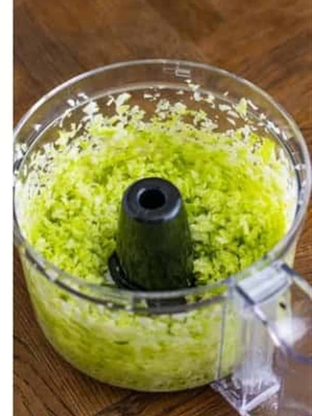 Finely chopped cabbage in a food processor.
