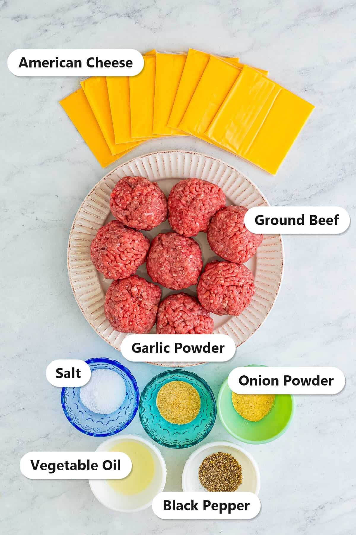 Labeled ingredients for smash burgers including ground beef, American cheese, salt, black pepper, garlic powder, onion powder, and vegetable oil.