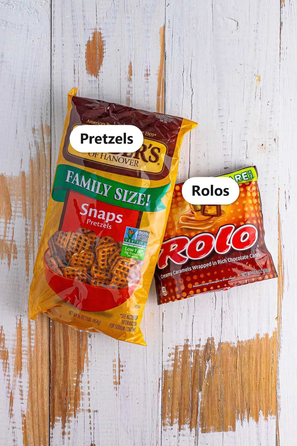 Labeled ingredients for rolo pretzels including square pretzels and Rolo candies.