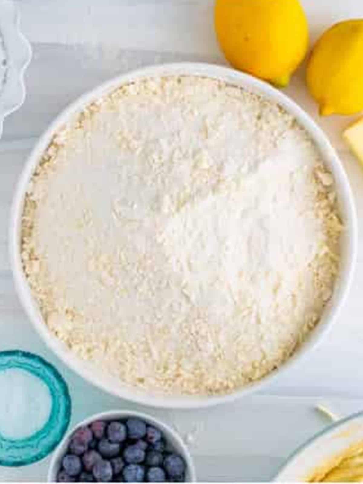 Lemon streusel crumb topping in a white bowl.