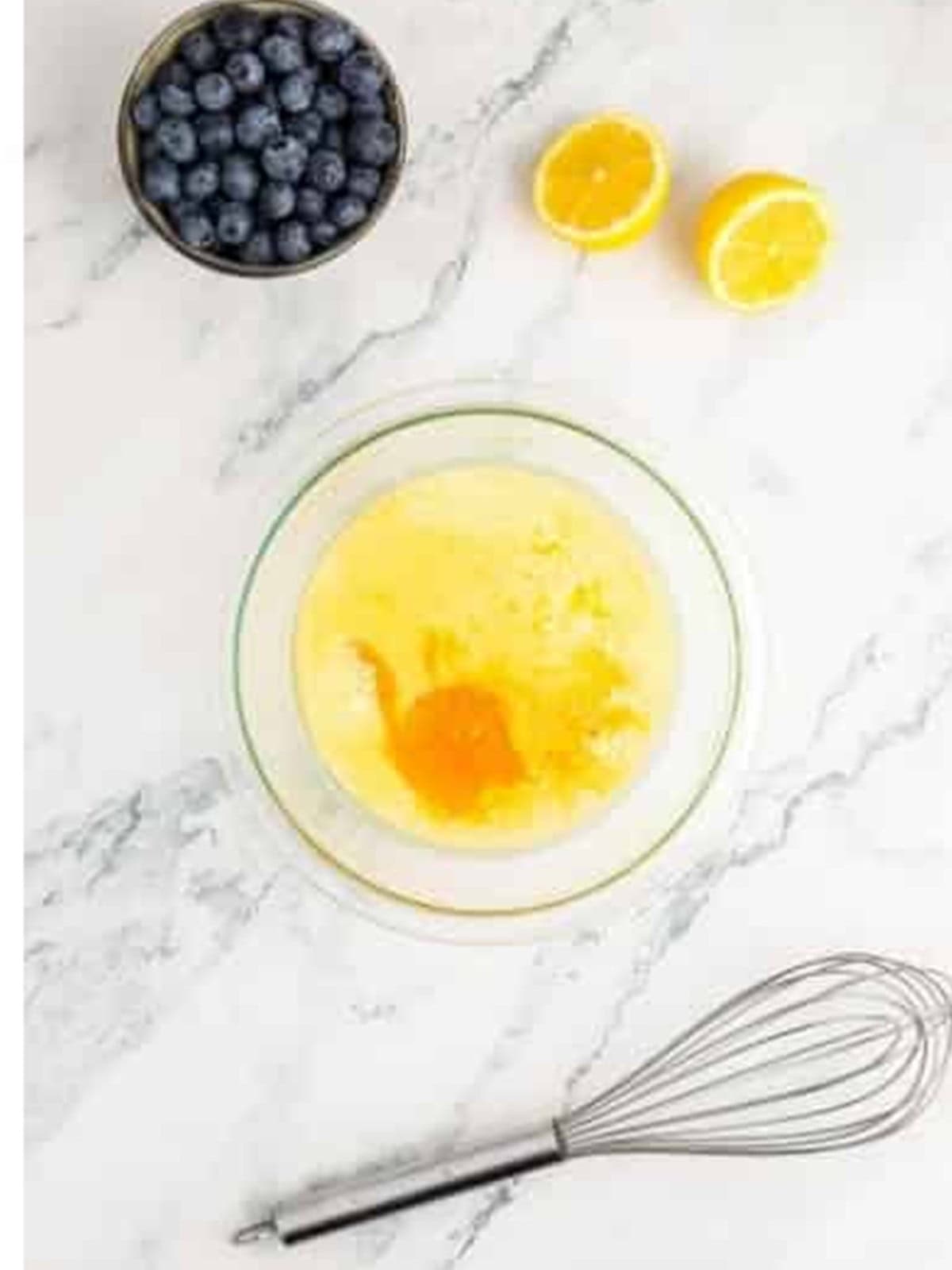 Buttermilk, oil, egg, lemon juice, and vanilla in a bowl for the wet ingredients.
