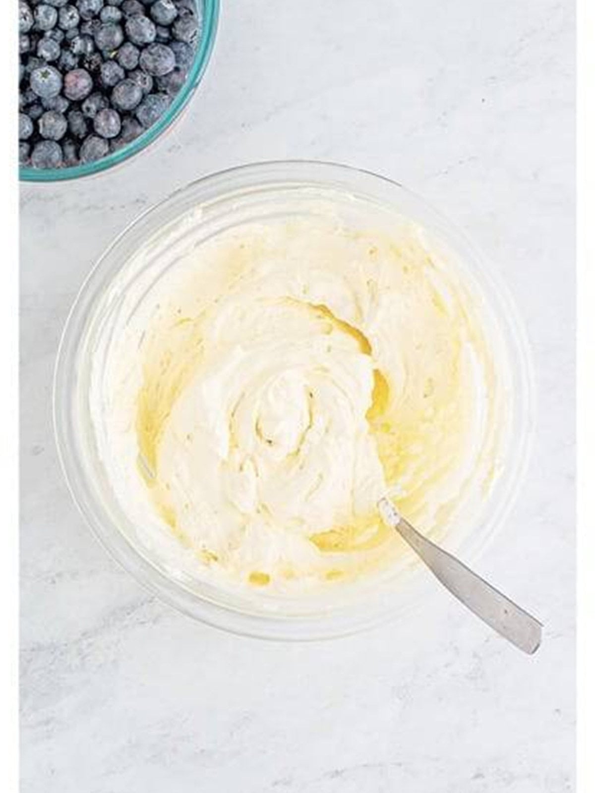 Lemon curd folded into whipped topping until smooth.