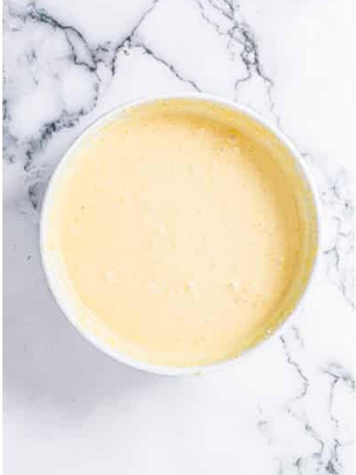 Smooth lemon bread batter with lemon zest stirred in.