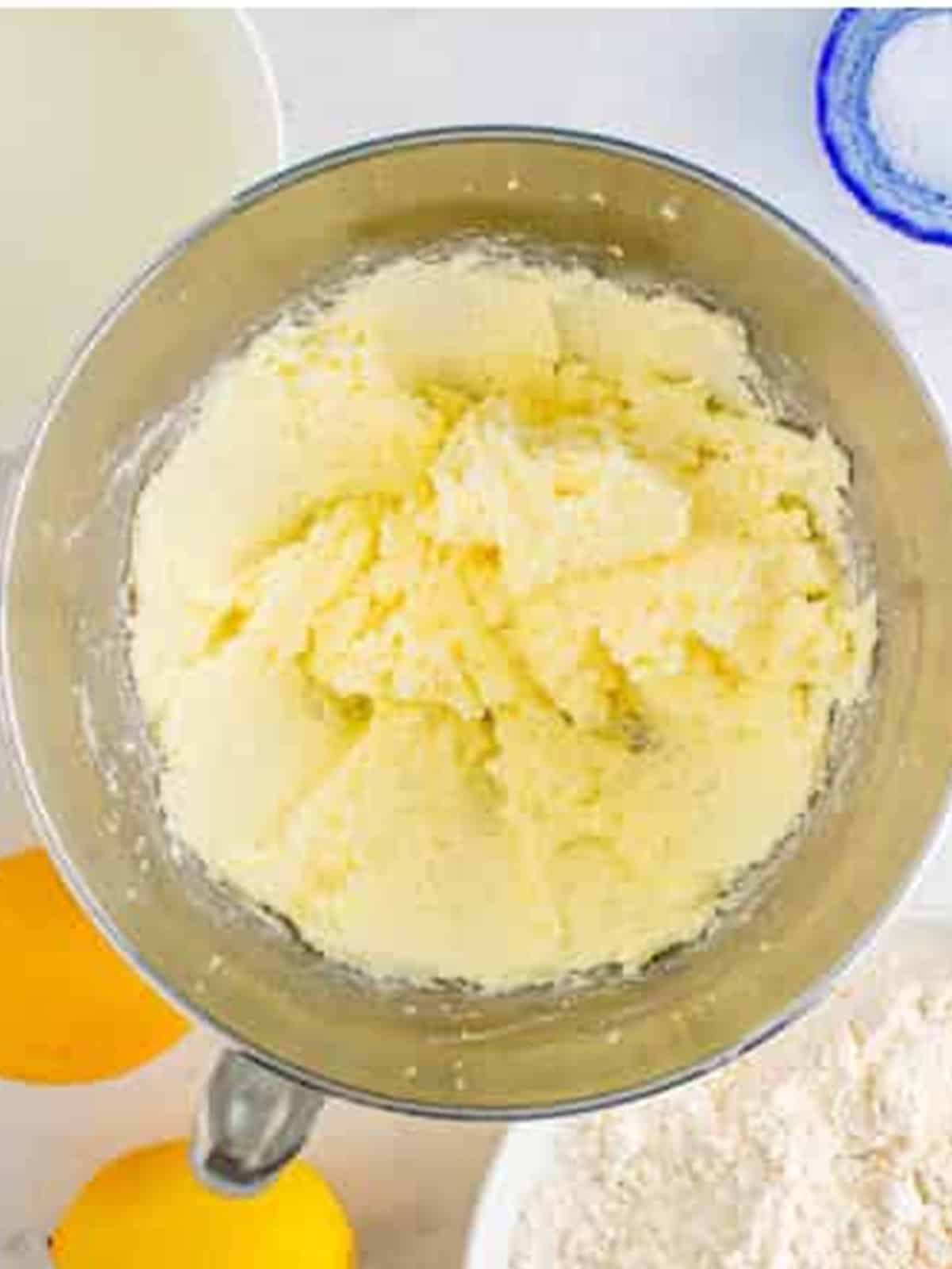 Creaming butter and sugar together in a stand mixer bowl.