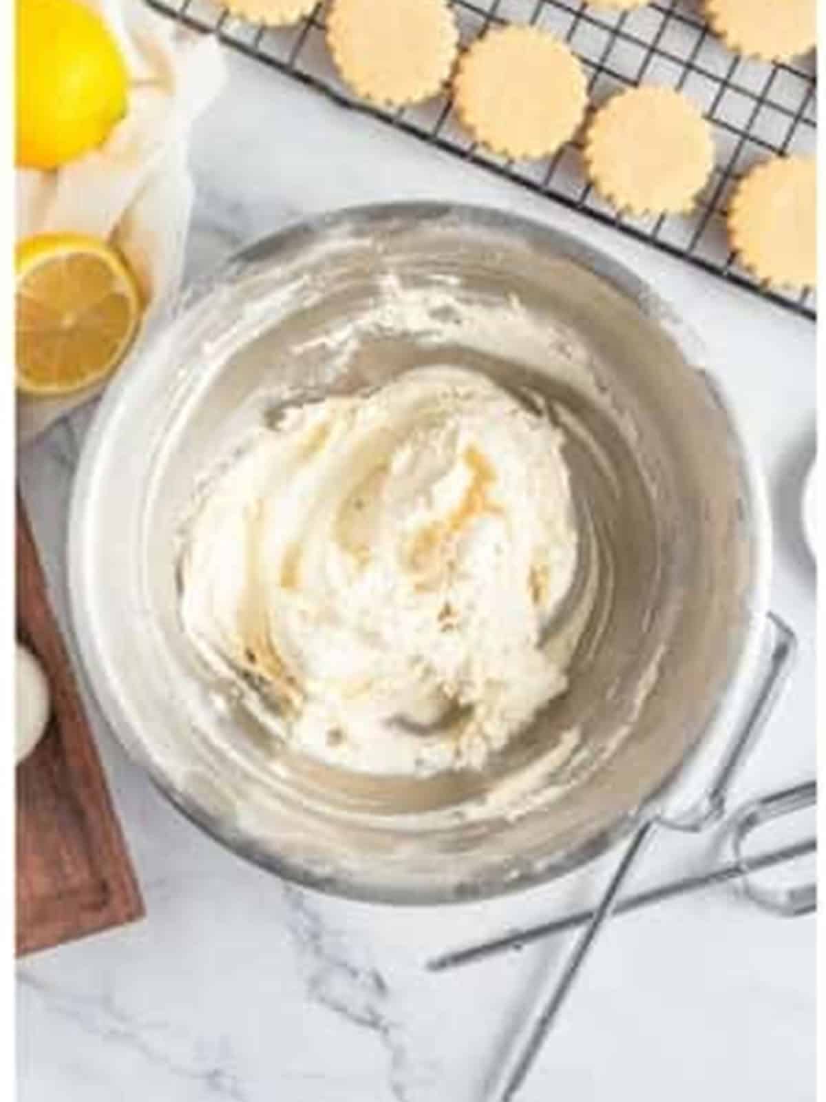 Smooth lemon cream filling whipped in a bowl.