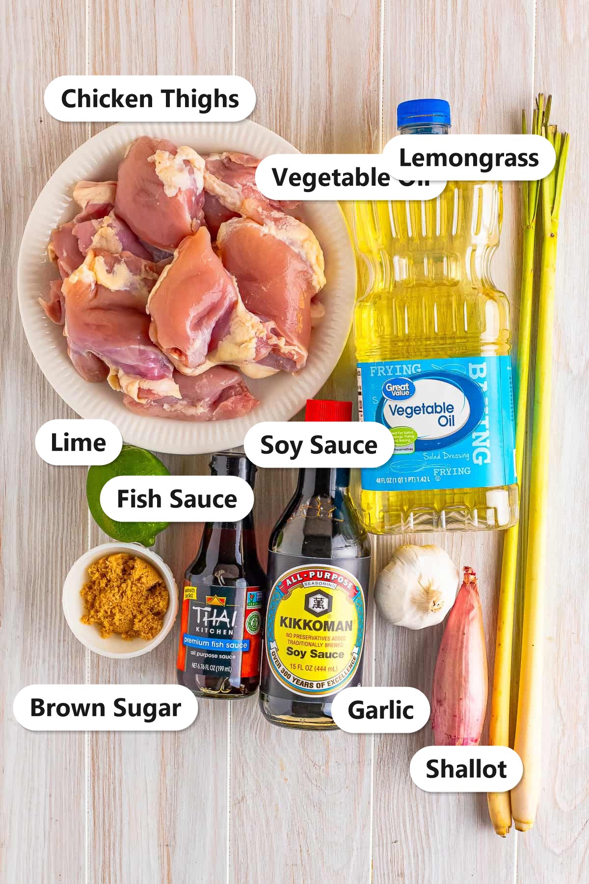Lemongrass chicken ingredients labeled including chicken thighs, lemongrass, lime, garlic, shallot, fish sauce, and soy sauce.