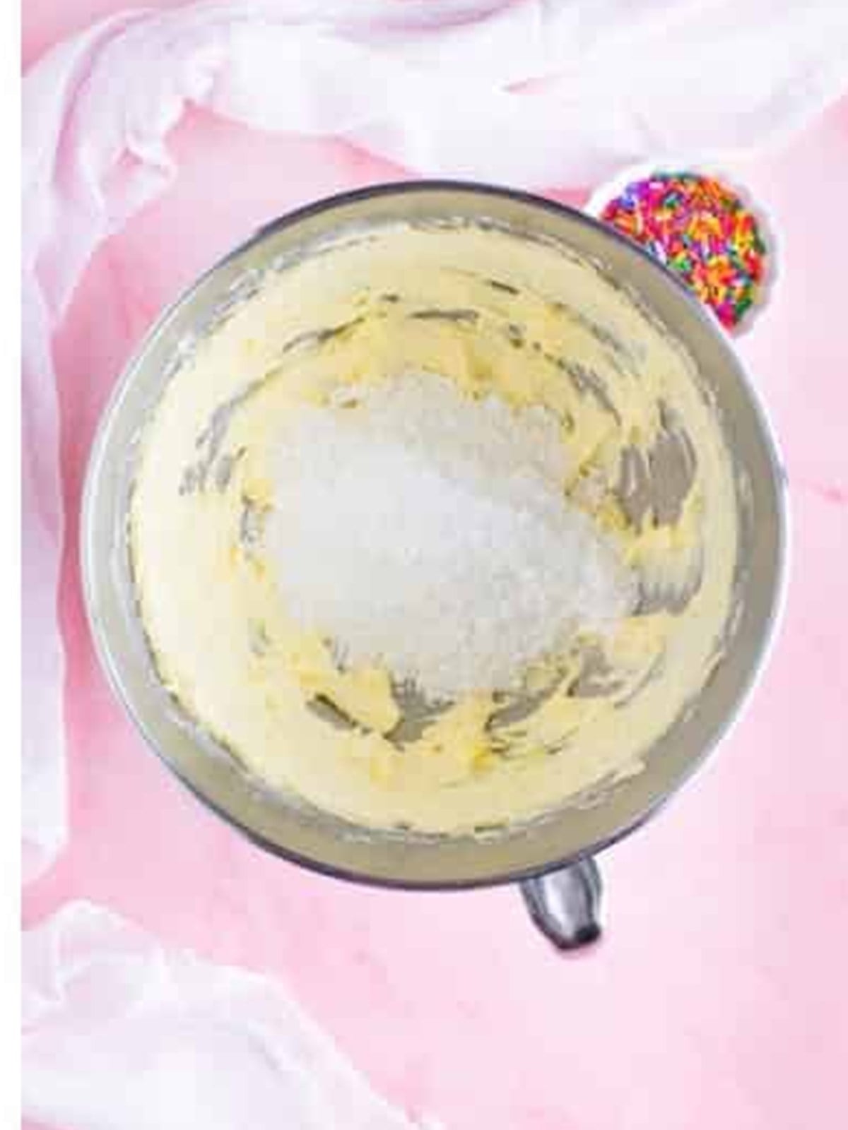 Powdered sugar beaten into the creamed butter for lofthouse cookie dough.