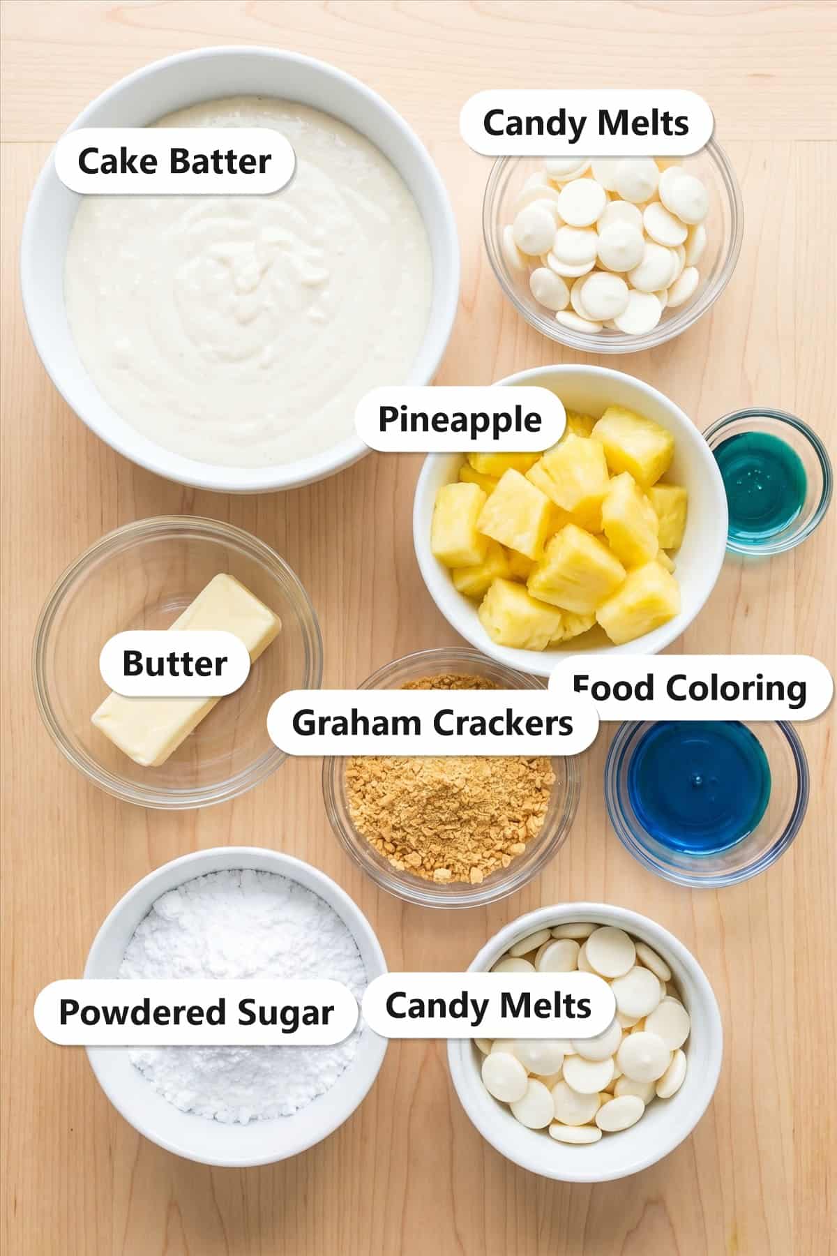 Labeled ingredients to make a triple pineapple luau cake.