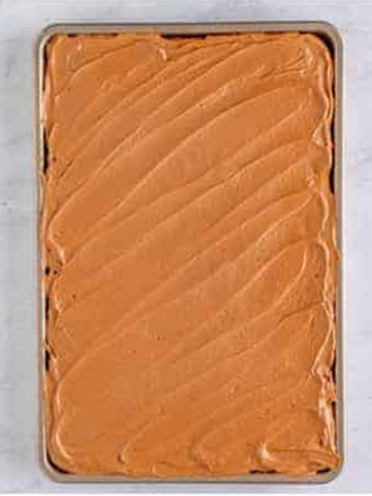Lunch lady peanut butter bars topped with smooth chocolate frosting.