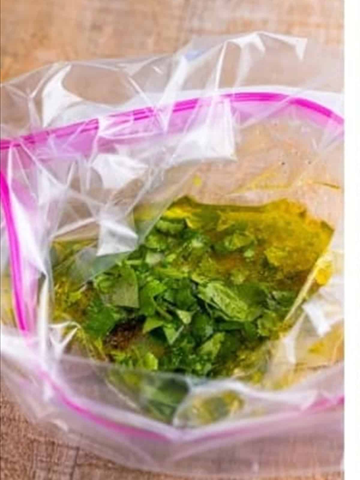 Lime marinade with cilantro in a bag for mahi mahi fish tacos.
