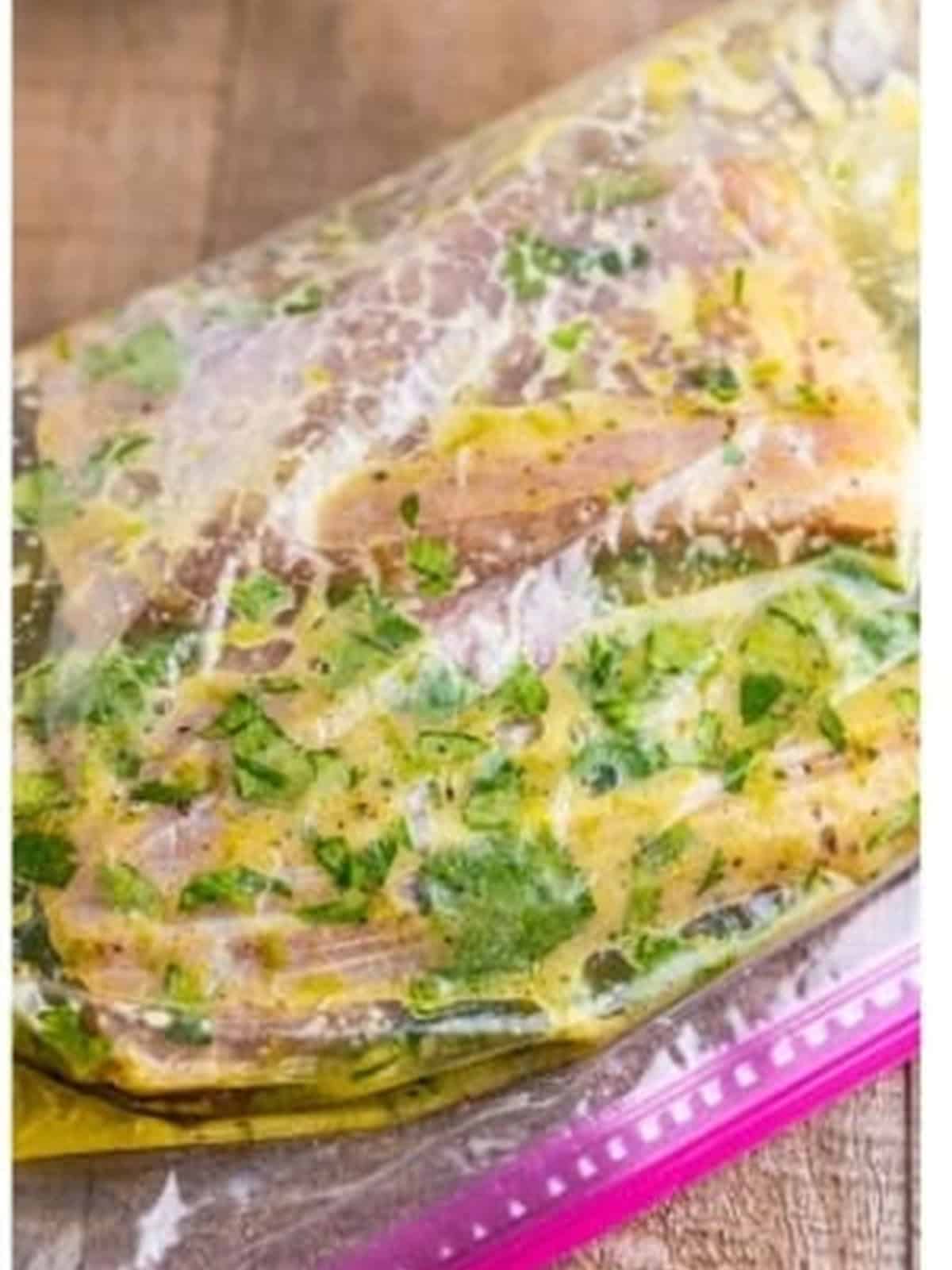 Mahi filets marinating in the lime cilantro marinade for fish tacos.