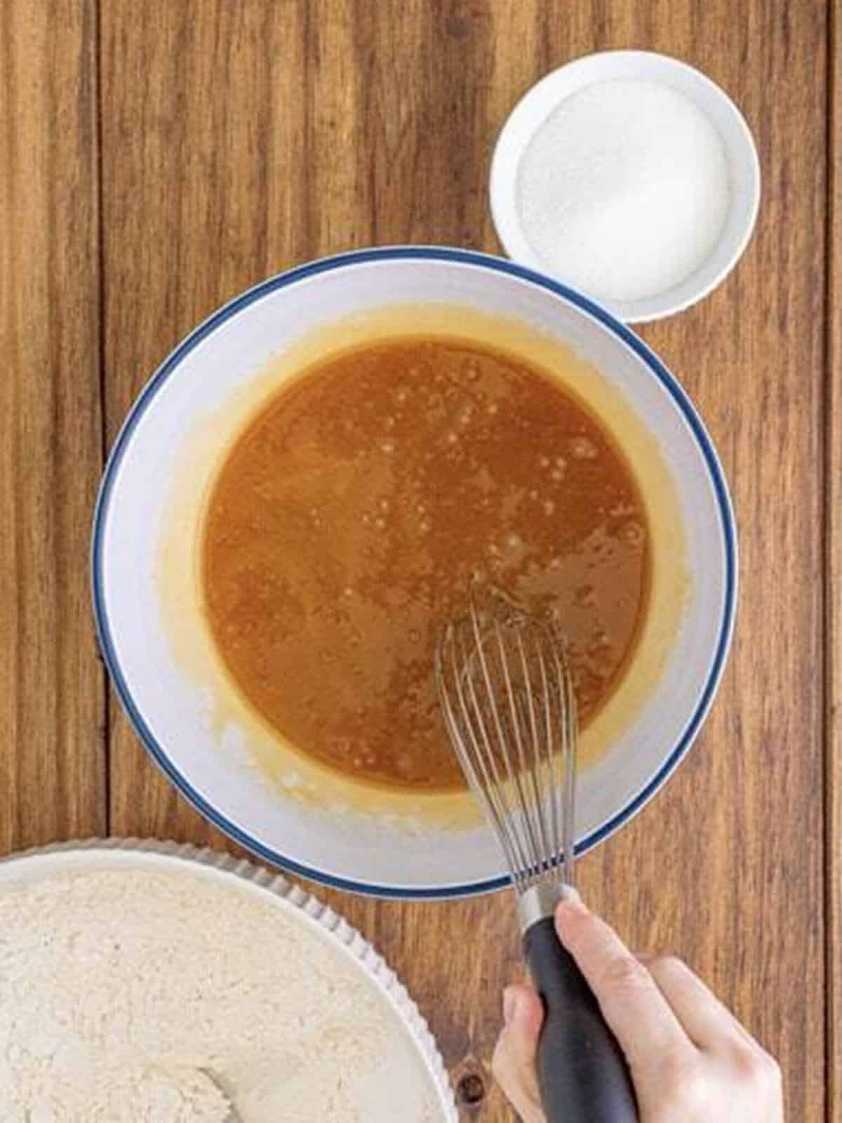 Maple syrup and maple extract whisked into the wet ingredients until smooth.