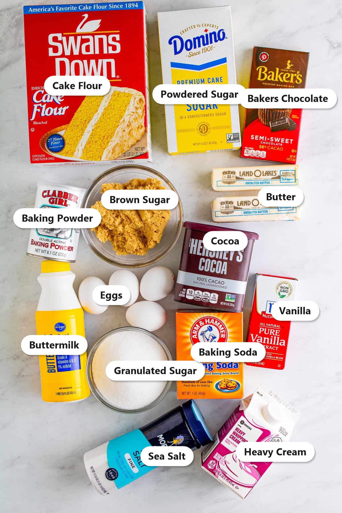 Marble cake ingredients labeled on a marble counter
