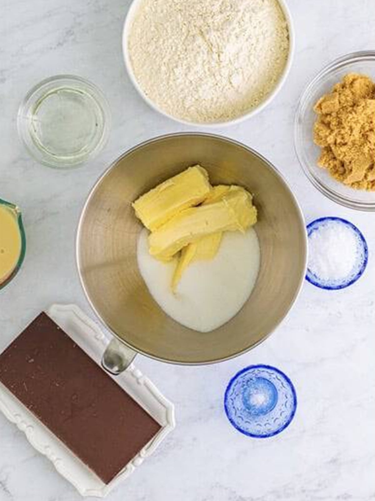 Creaming butter and sugar in a mixing bowl for millionaires shortbread.