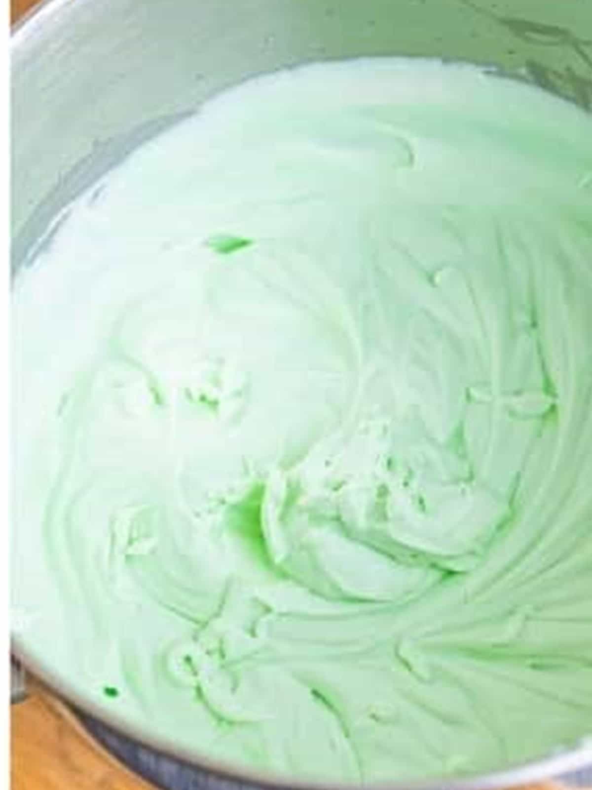 Green mint mixture after adding condensed milk, mint extract, and food coloring.