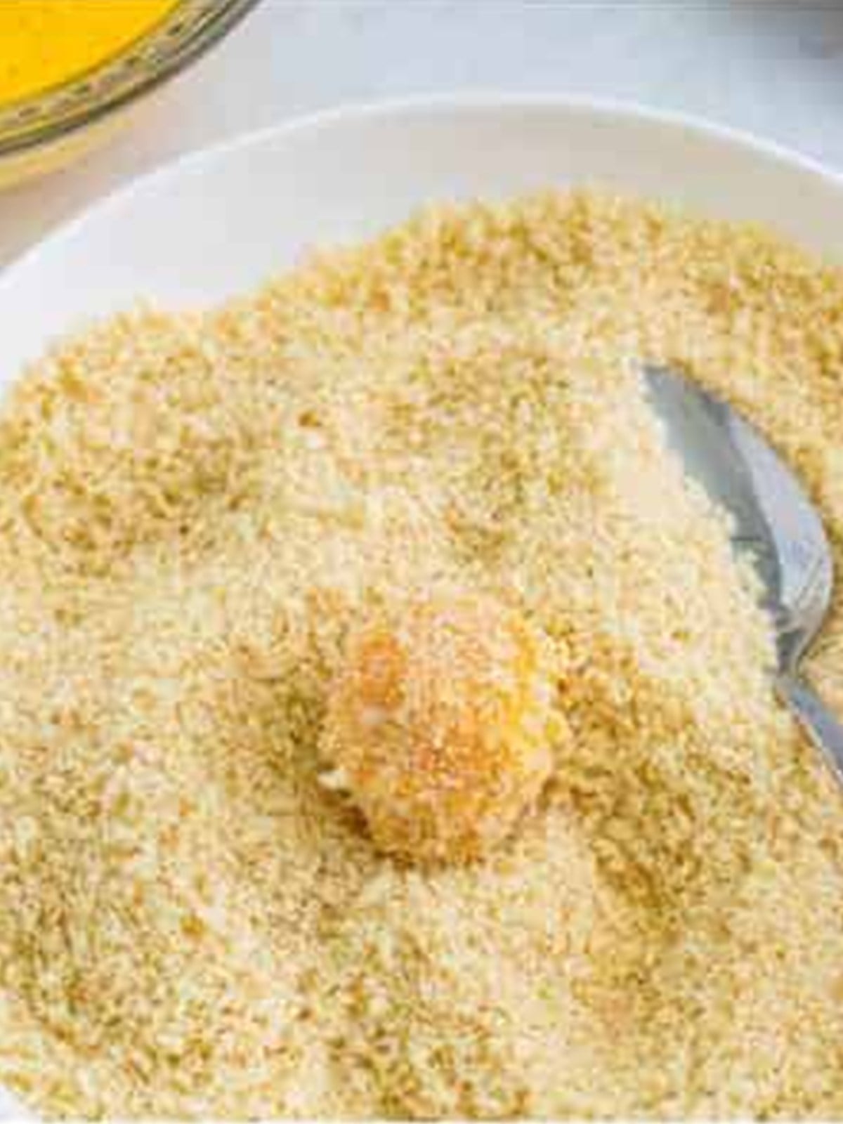 Mac and cheese ball coated in panko breadcrumbs.