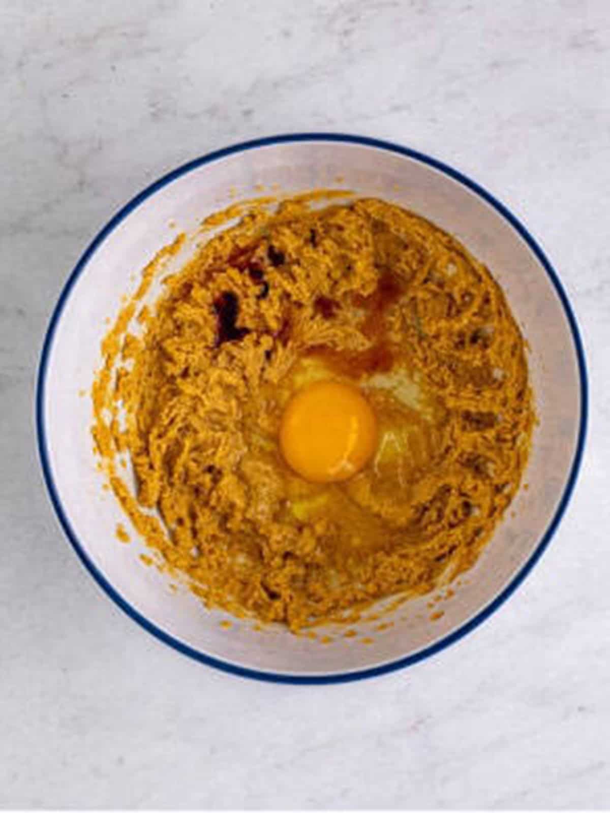 Egg and vanilla added to the creamed peanut butter mixture.