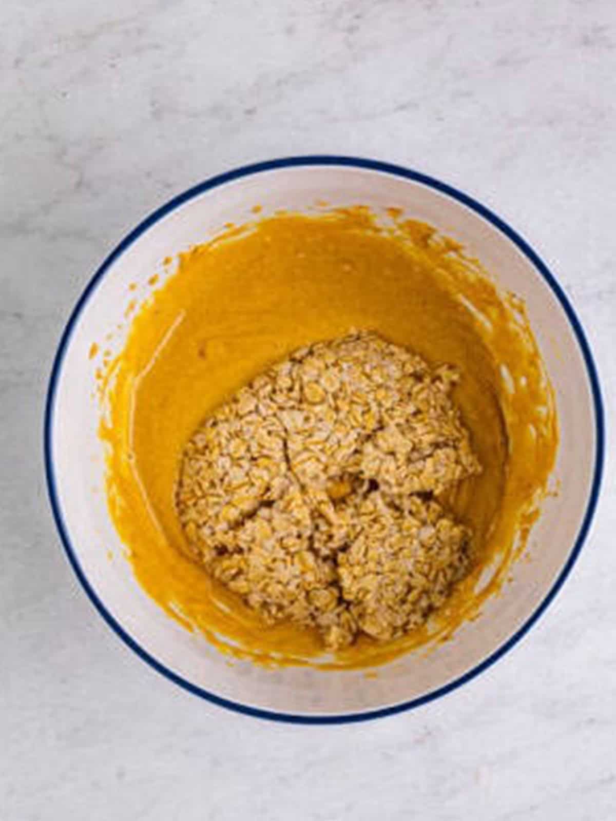Cooled soaked oatmeal added to the cupcake batter.