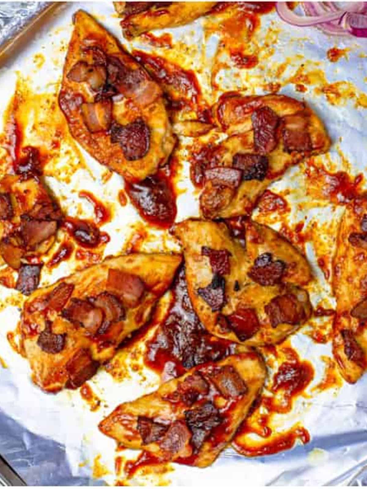BBQ chicken topped with crumbled bacon.