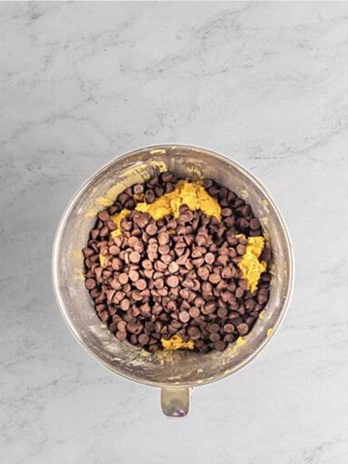 Semi sweet chocolate chips stirred into the Mrs Fields cookie dough.