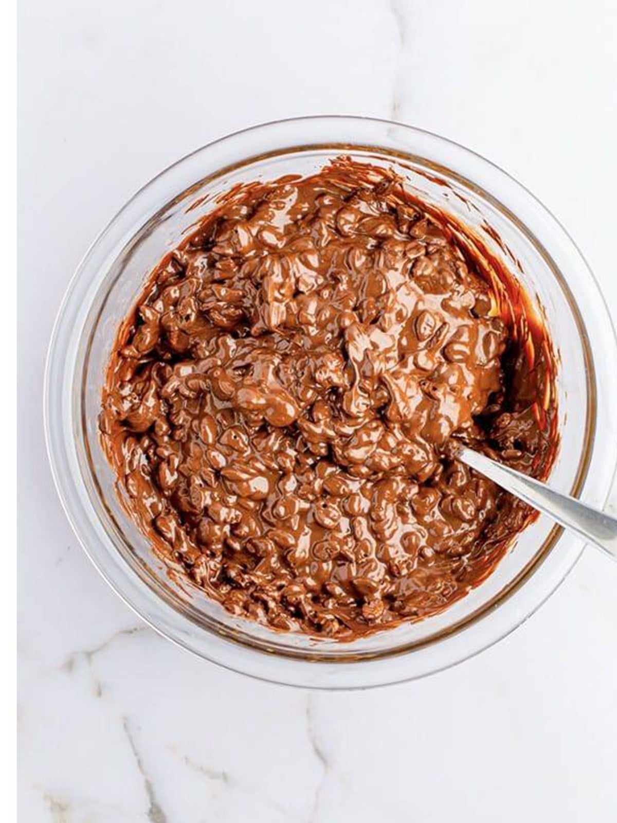 Rice krispies stirred into melted chocolate.