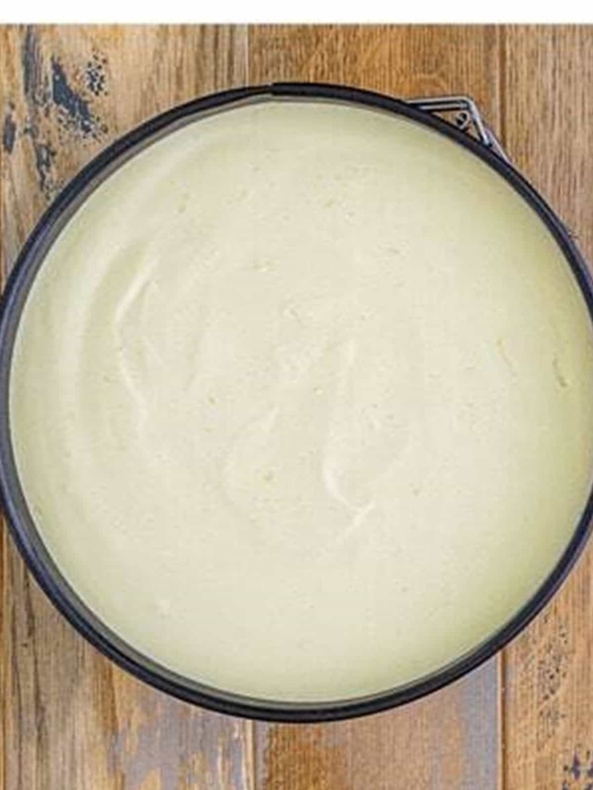 Lemon filling poured into the graham cracker crust and smoothed.