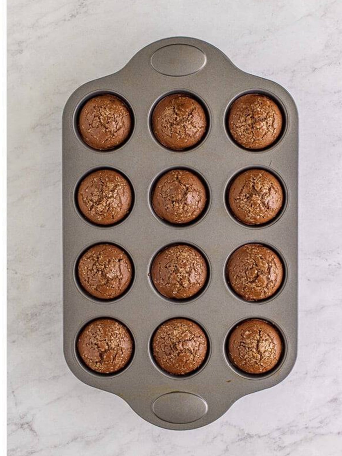 Baked Nutella Muffins in the muffin tin.