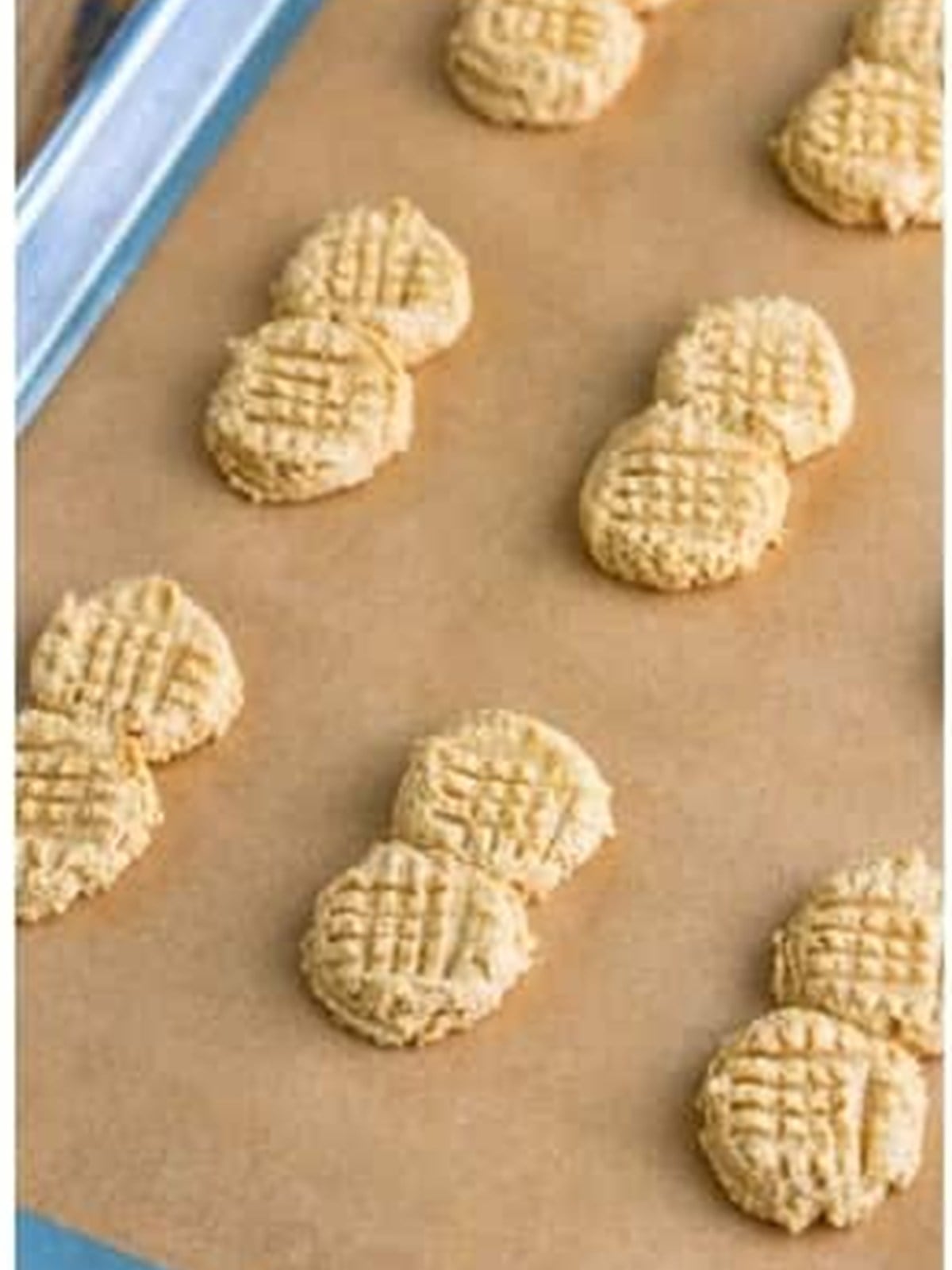 Crosshatch fork pattern pressed into the nutter butter cookie dough.