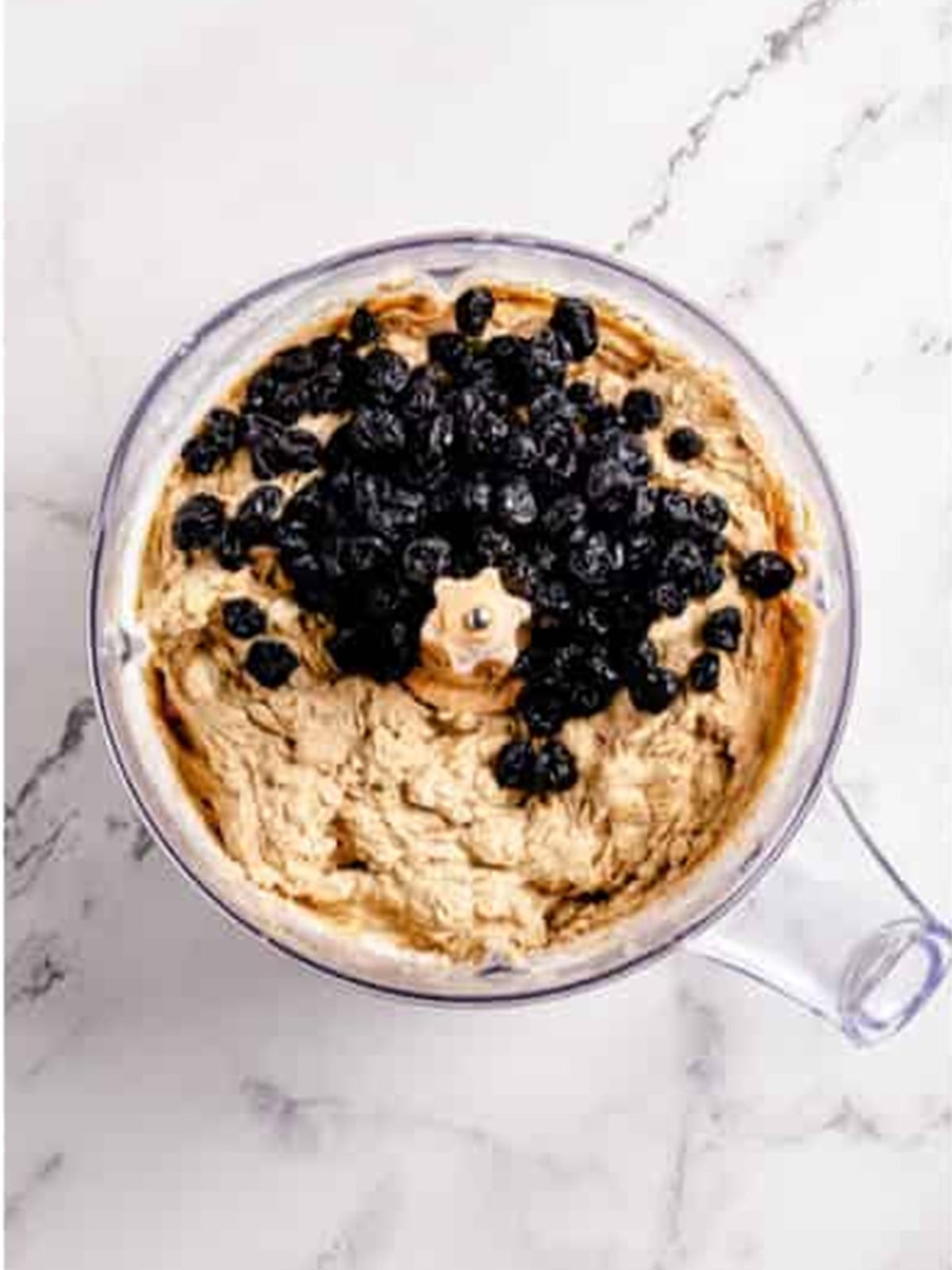 Dried blueberries added to the oatmeal cookie dough.