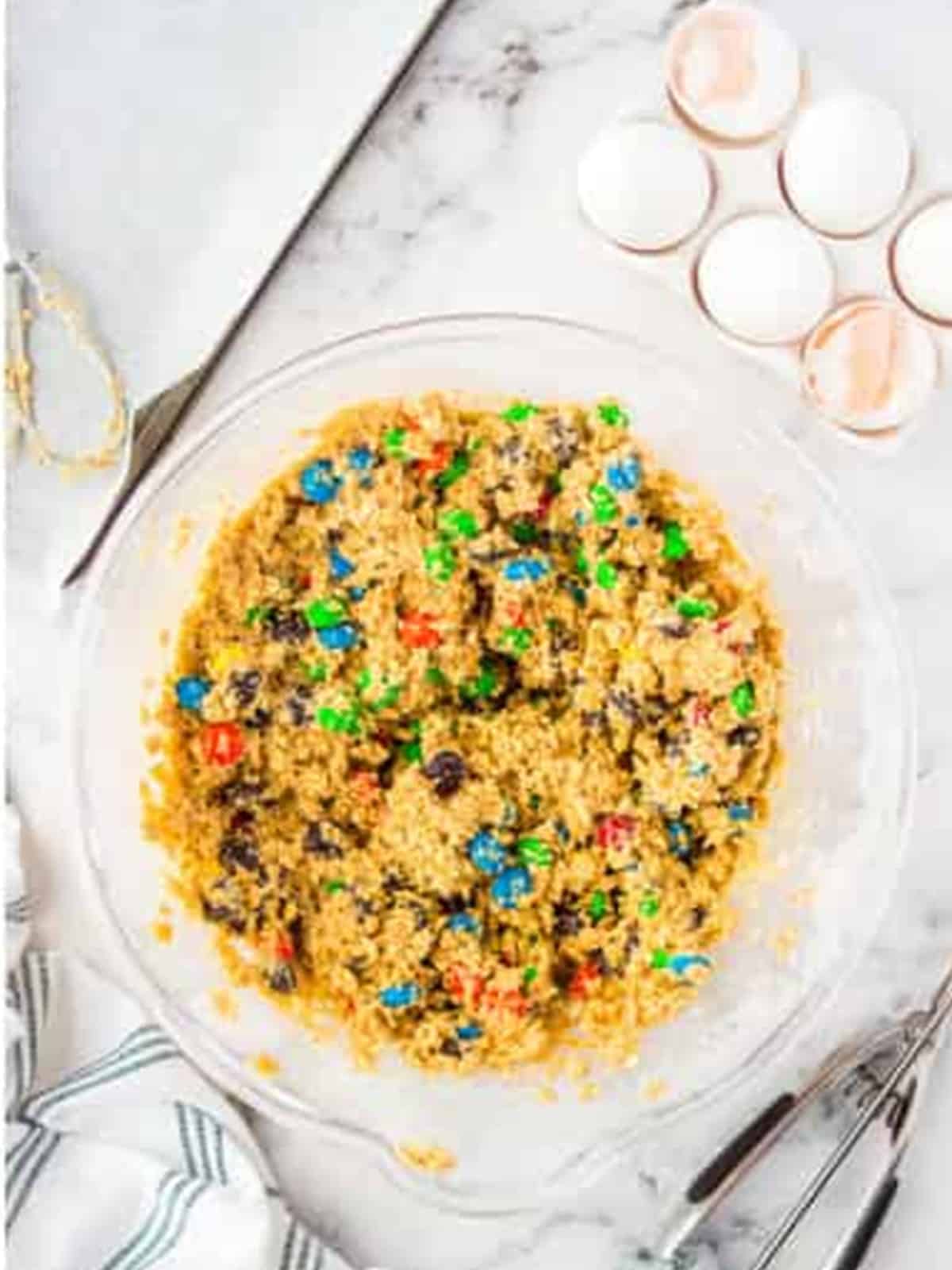 Colorful M&Ms stirred through the oatmeal cookie dough.
