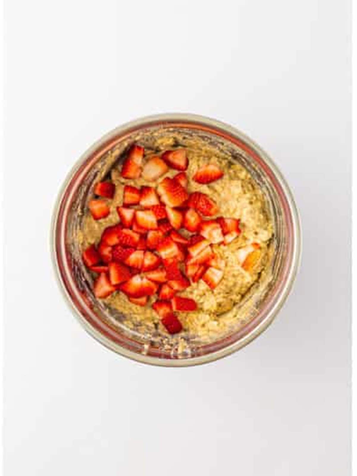 Finely chopped fresh strawberries folded into the oatmeal pancake batter.