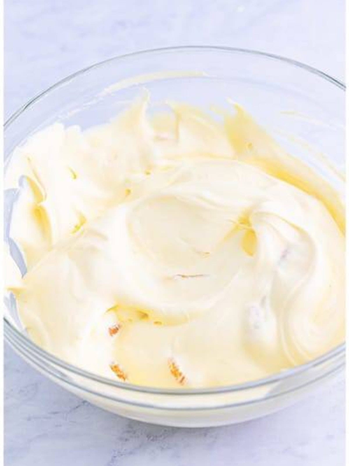 Mandarin oranges stirred into the creamy topping.