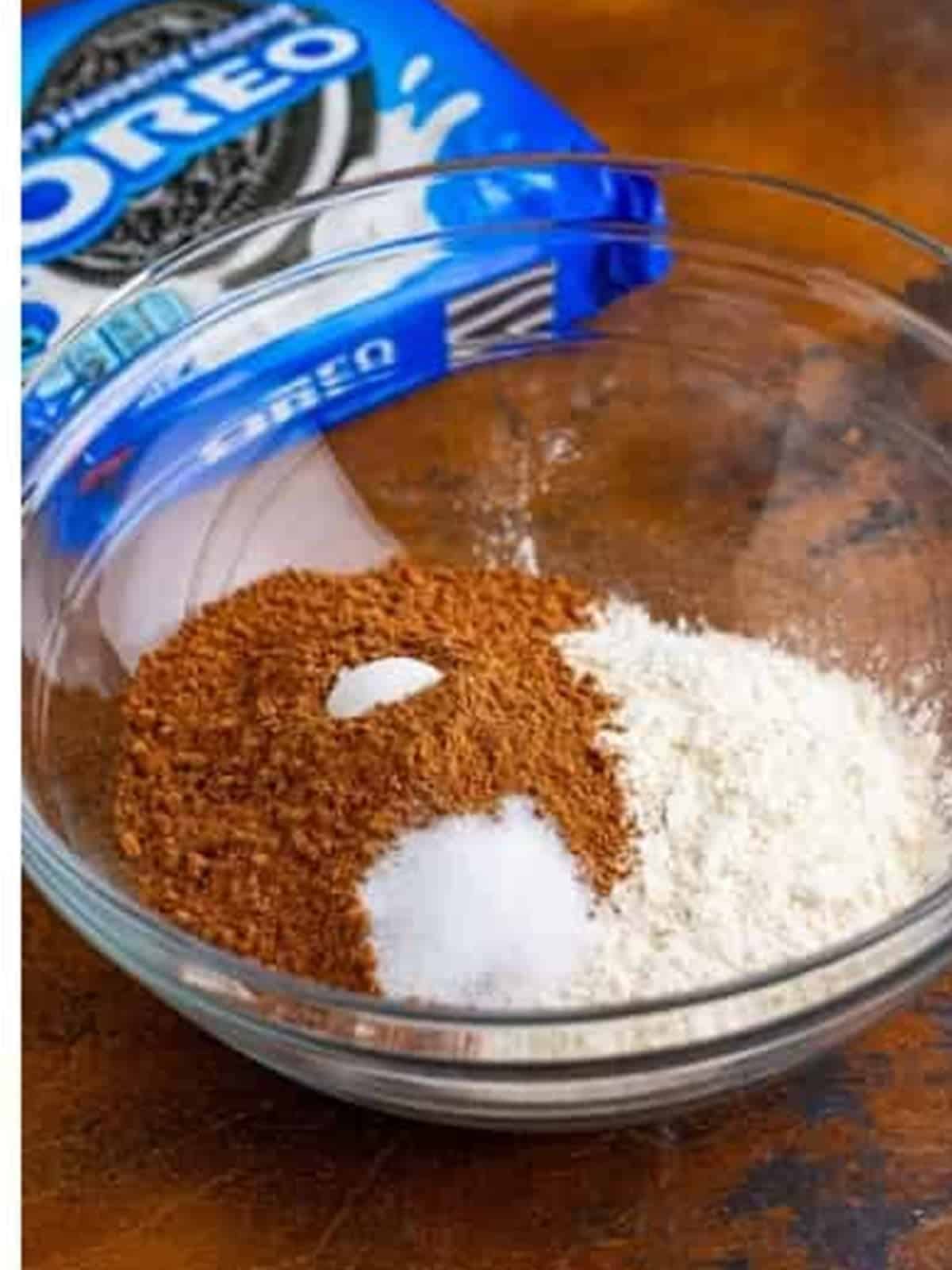 Flour, cocoa powder, baking powder, and salt whisked together in a bowl.