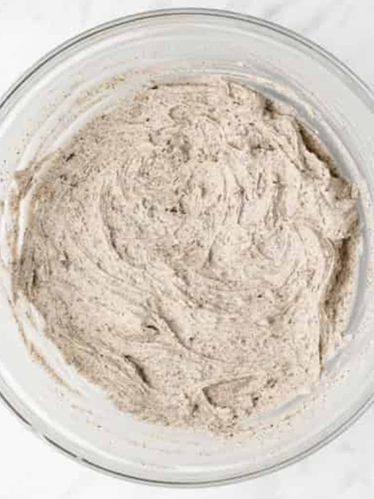 Crushed Oreos mixed into the cookies and cream buttercream frosting.