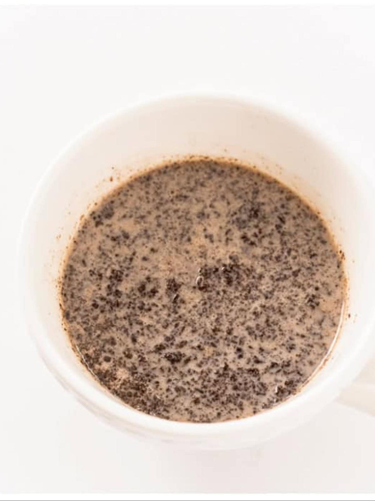 Smooth Oreo mug cake batter ready to microwave.