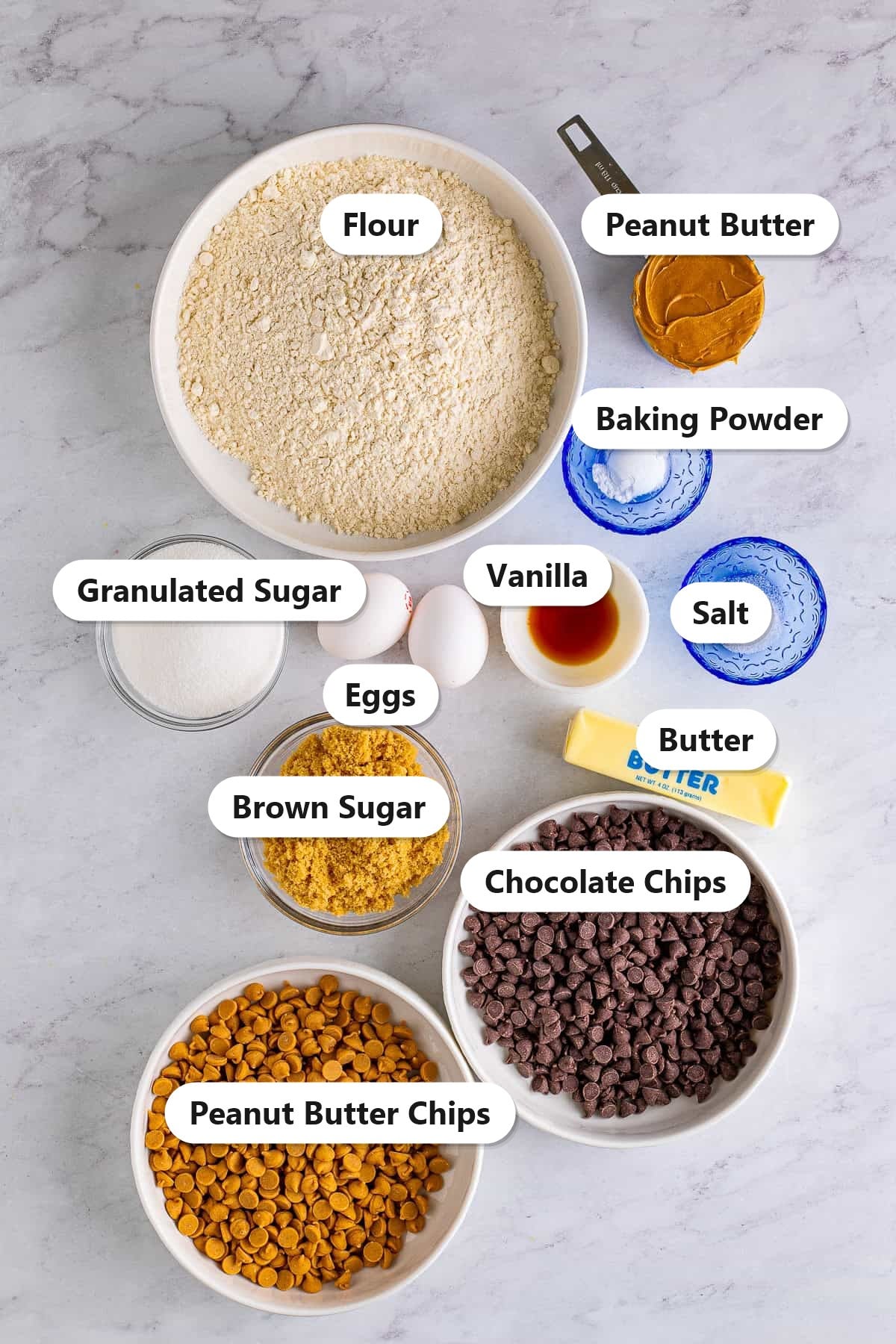 Labeled ingredients needed to make Peanut Butter Chocolate Chip Cookie Bars.