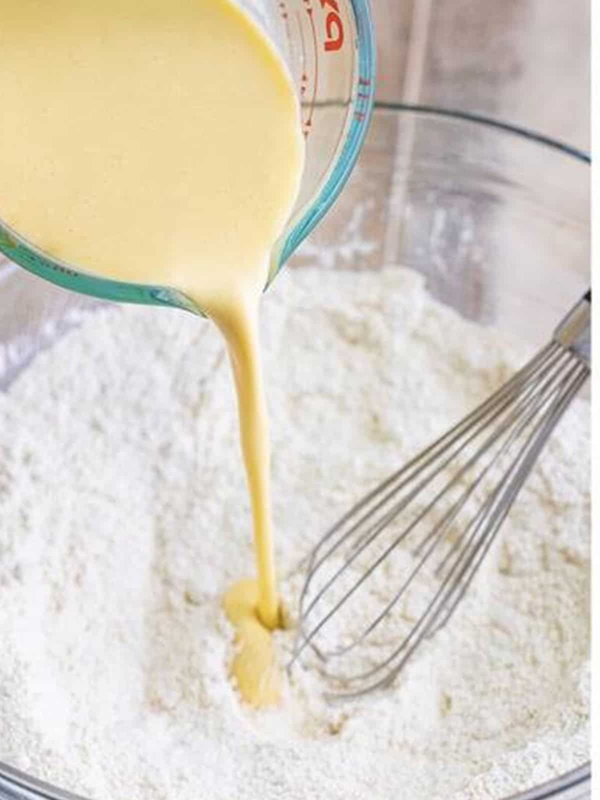 Mixing the batter for Peach Fritters.