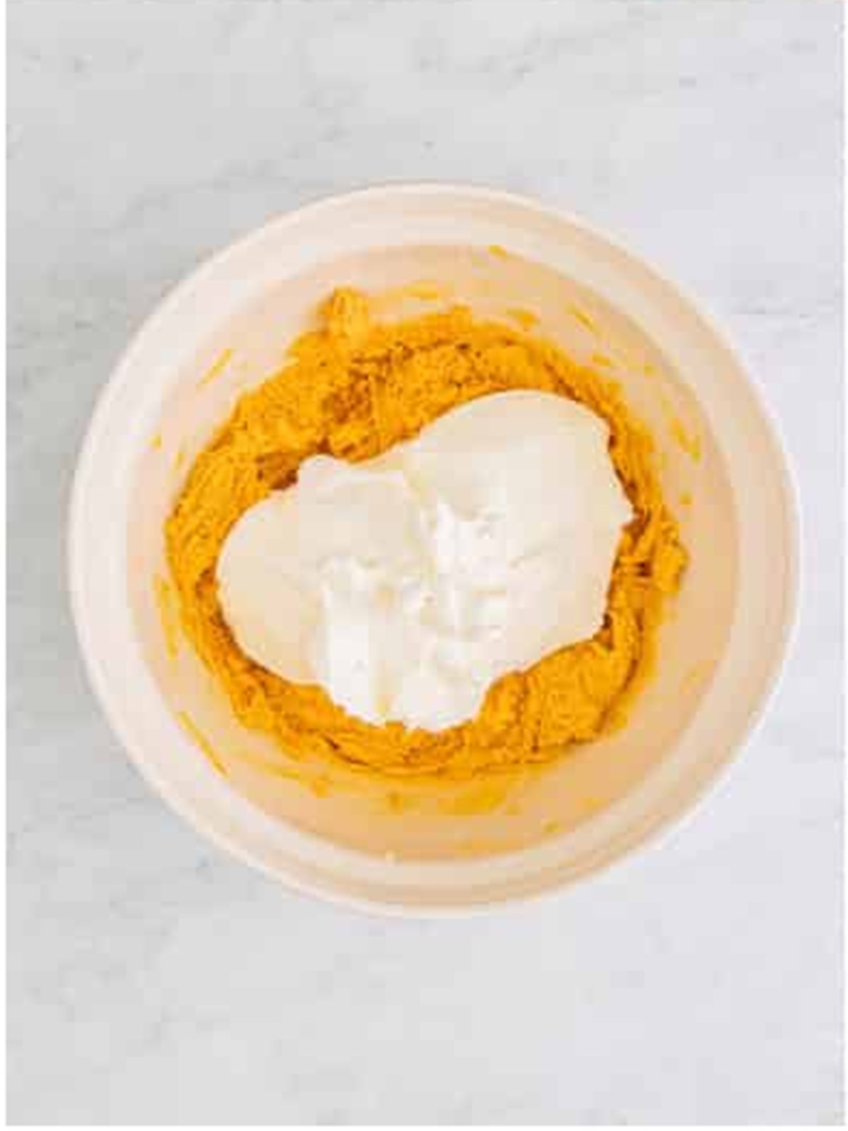 Cream cheese, peanut butter, and whipped topping beaten into a smooth peanut butter topping.