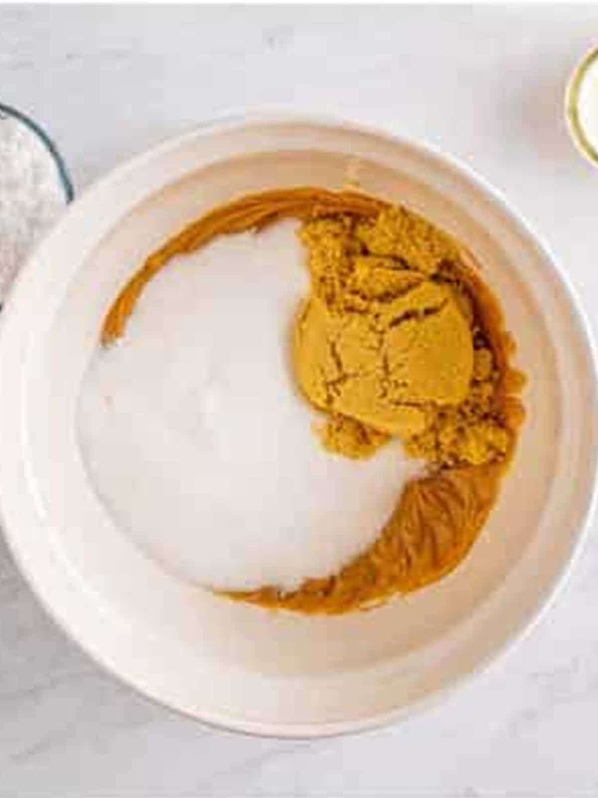 Granulated and brown sugar added to the creamed peanut butter and butter.