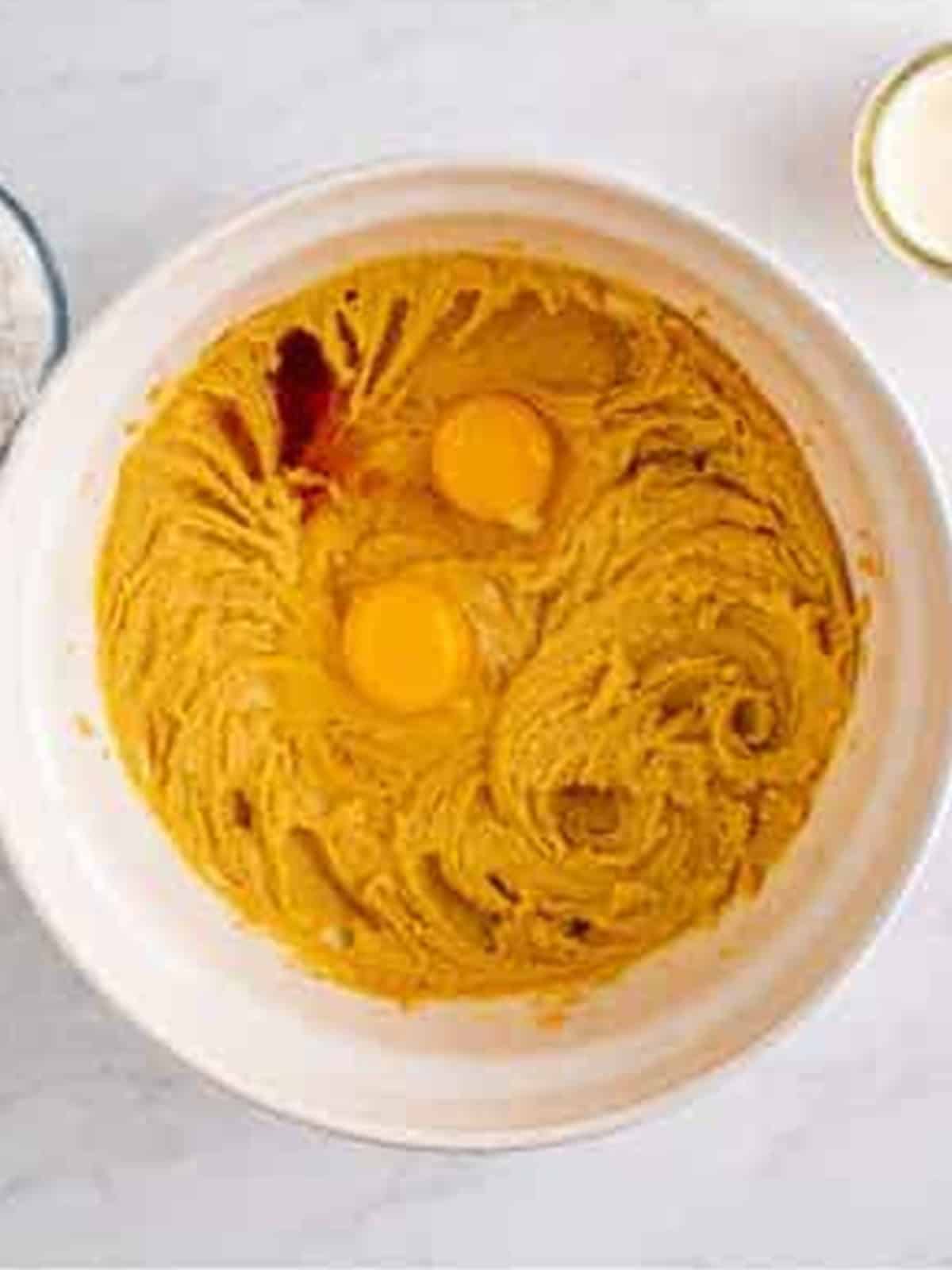 Eggs and vanilla beaten into the peanut butter cake batter.