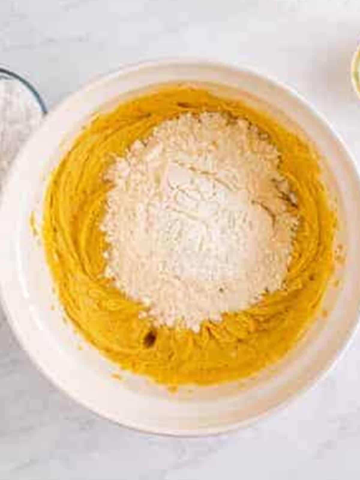 Flour mixture added to the peanut butter cake batter.