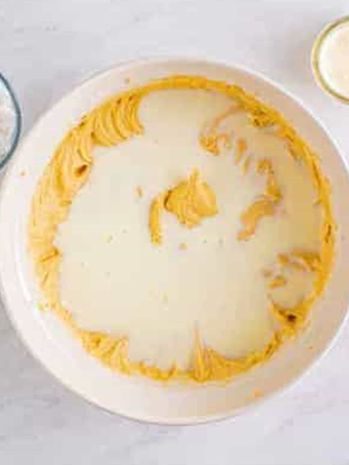 Whole milk added to the peanut butter cake batter and mixed until smooth.