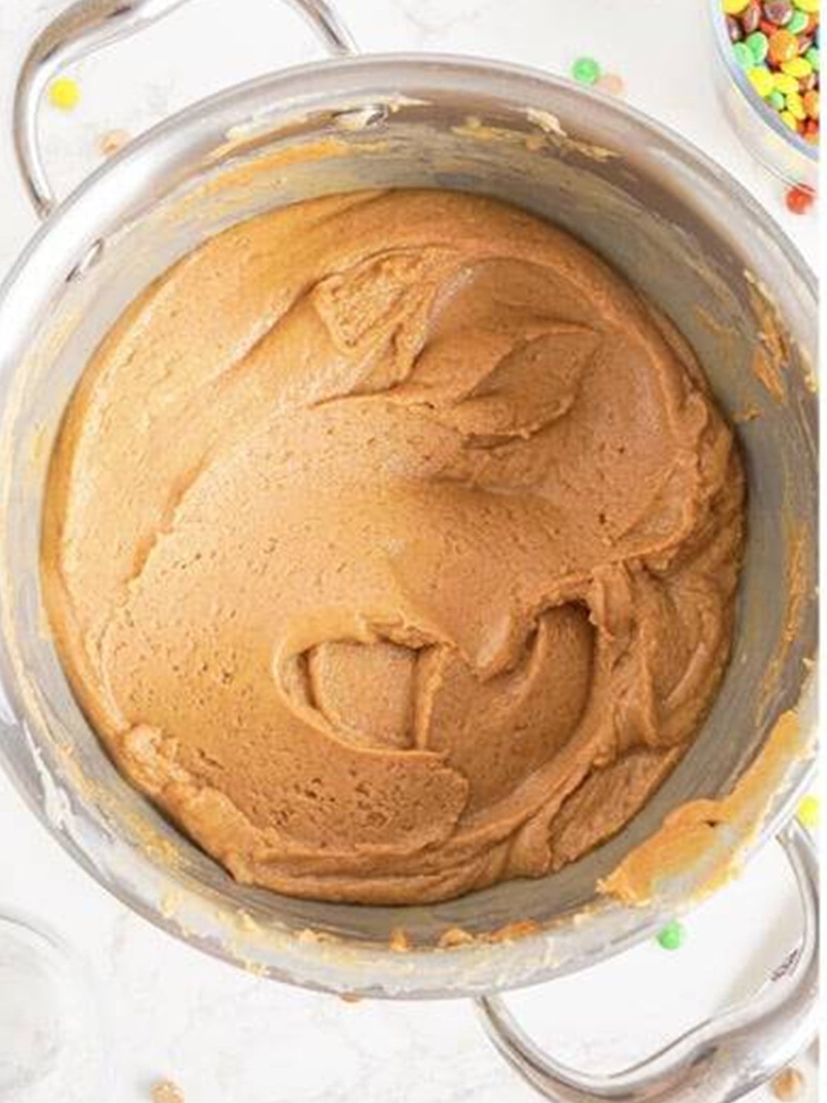 Smooth melted peanut butter fudge mixture in a pot.