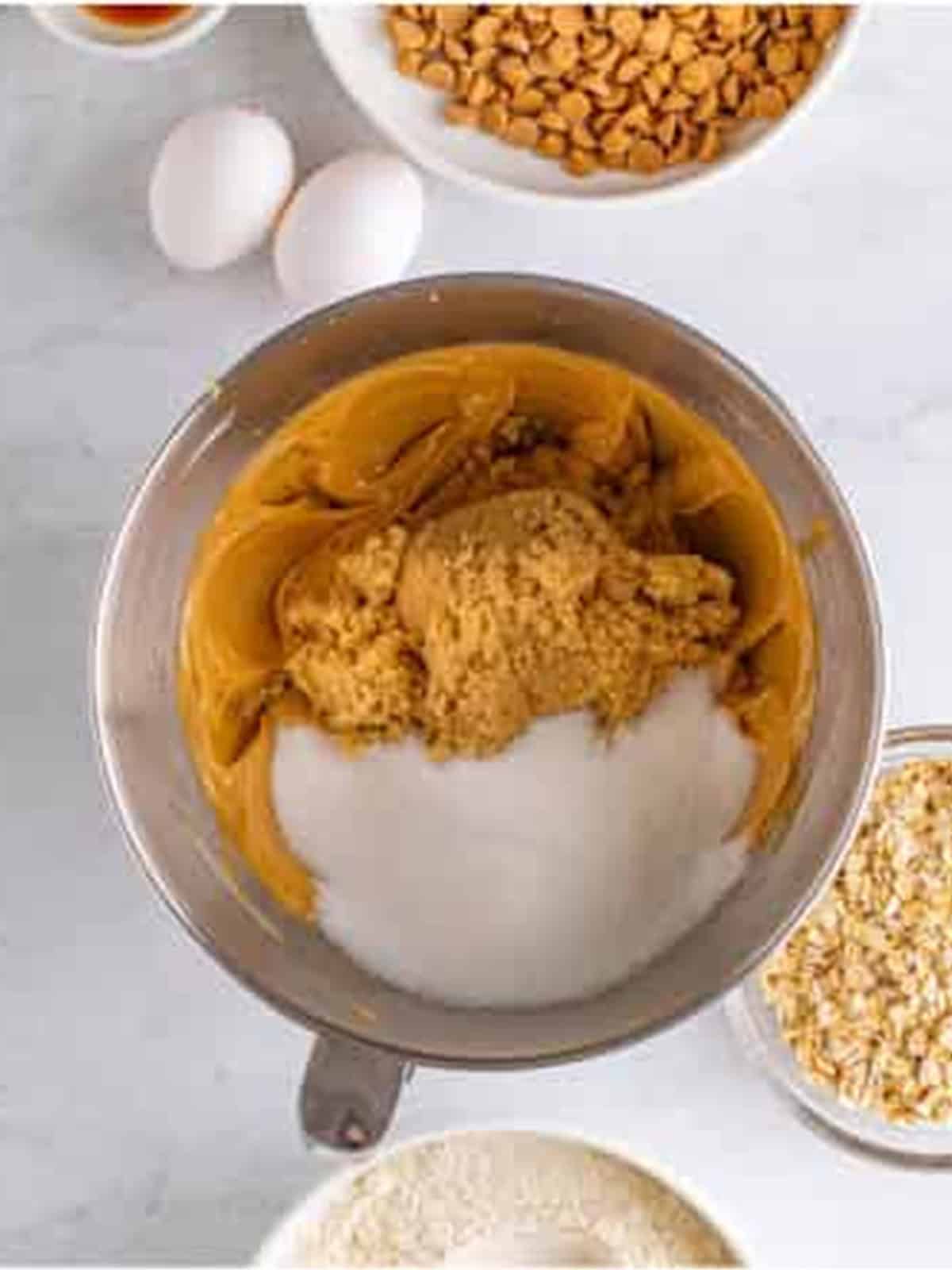 Brown sugar and granulated sugar added to the creamed peanut butter and butter.