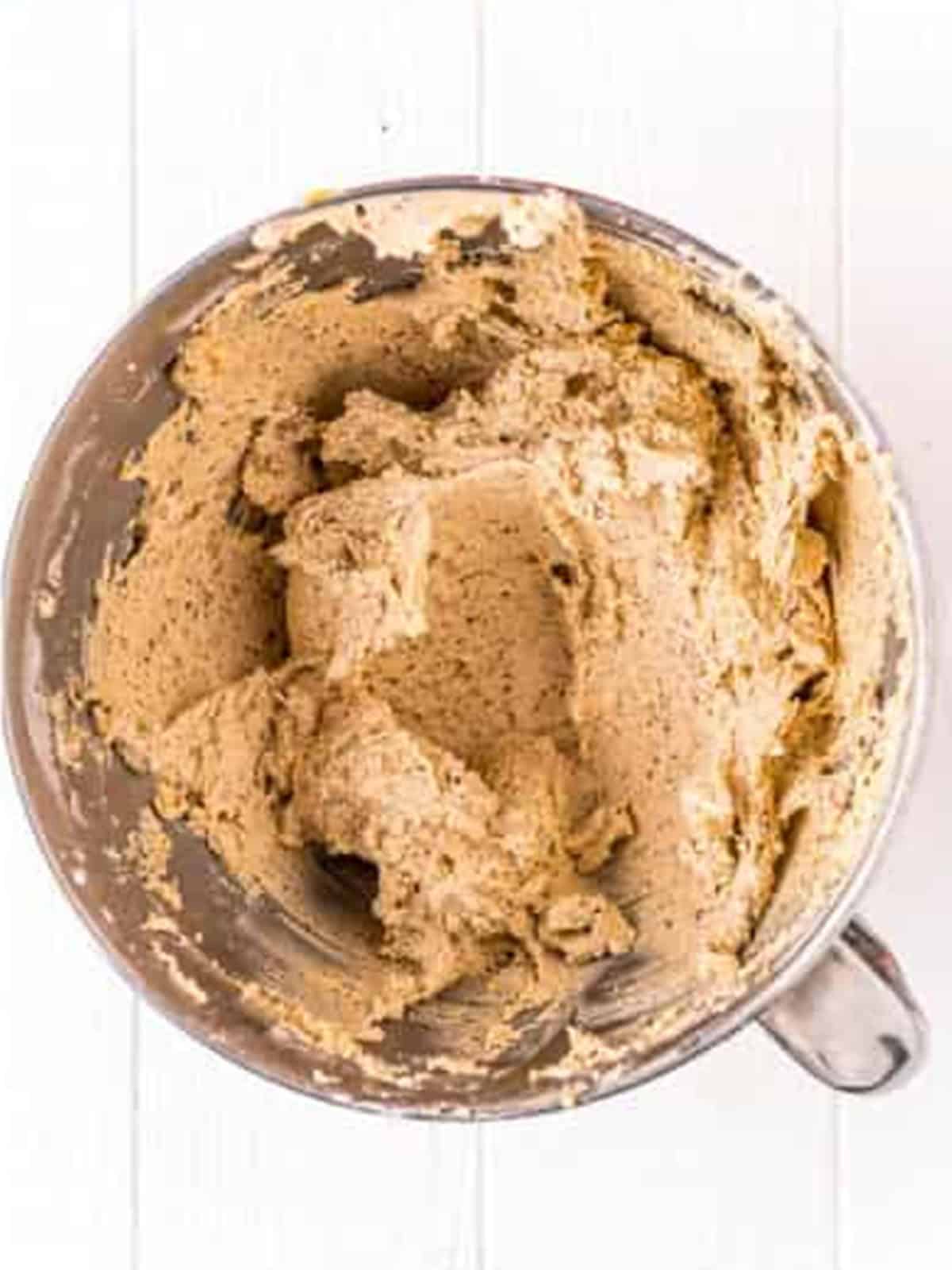 Flour and ground pecan mixture beaten into the pecan sandies cookie dough.