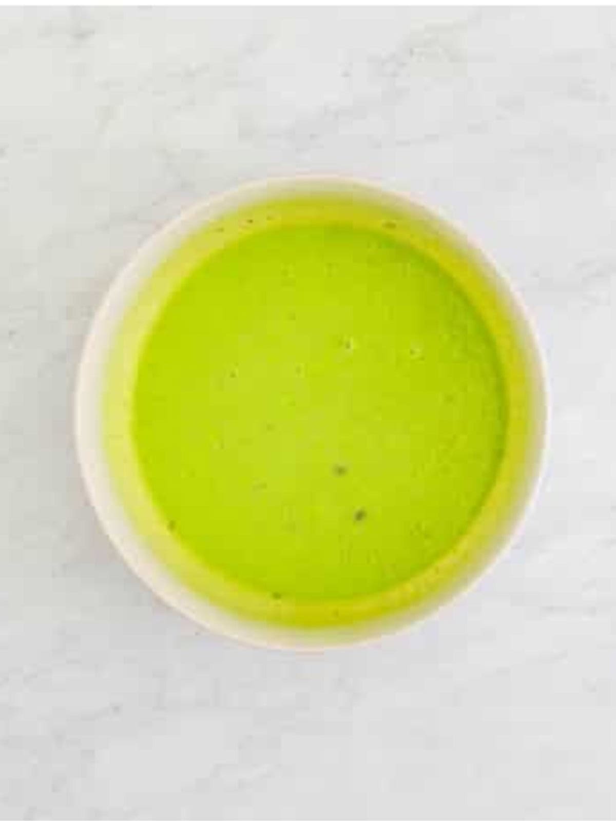 Pistachio pudding mix whisked into the batter until smooth and green.
