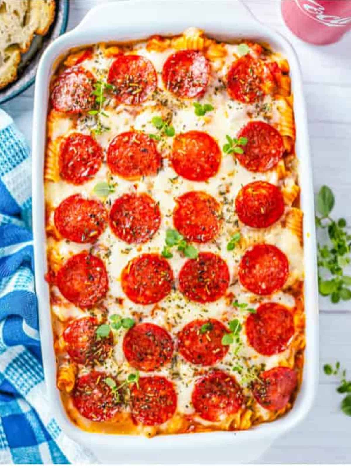 Baked pizza pasta casserole with melted mozzarella and pepperoni.
