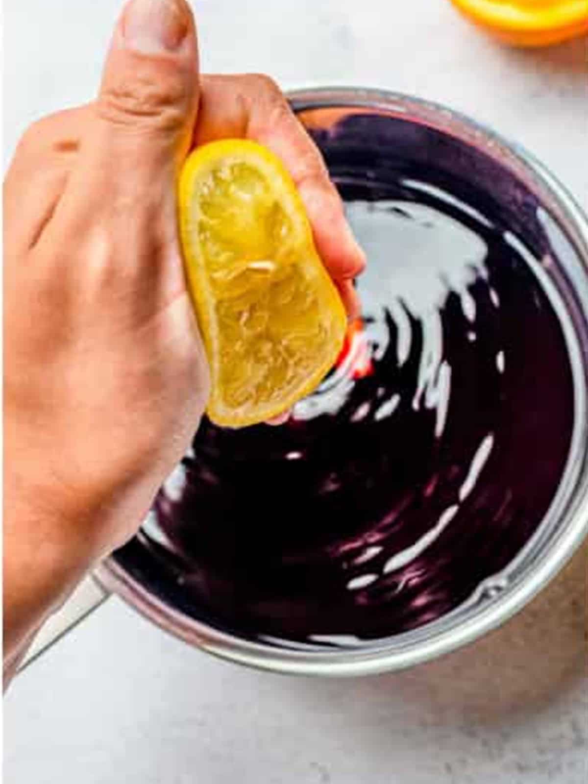 Lemon juice squeezed into the red wine poaching liquid.